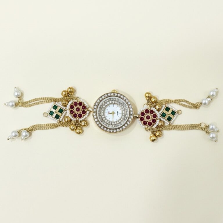 Gold ethnic watch bracelet with ruby stones, green accents, pearl tassels and layered chains